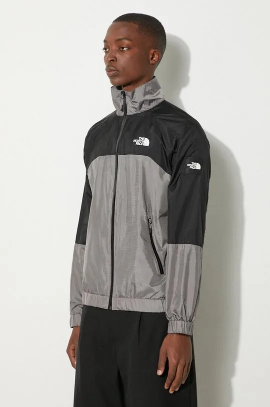 The North Face jacket Wind Shell Full Zip men's gray color NF0A879FRPI1